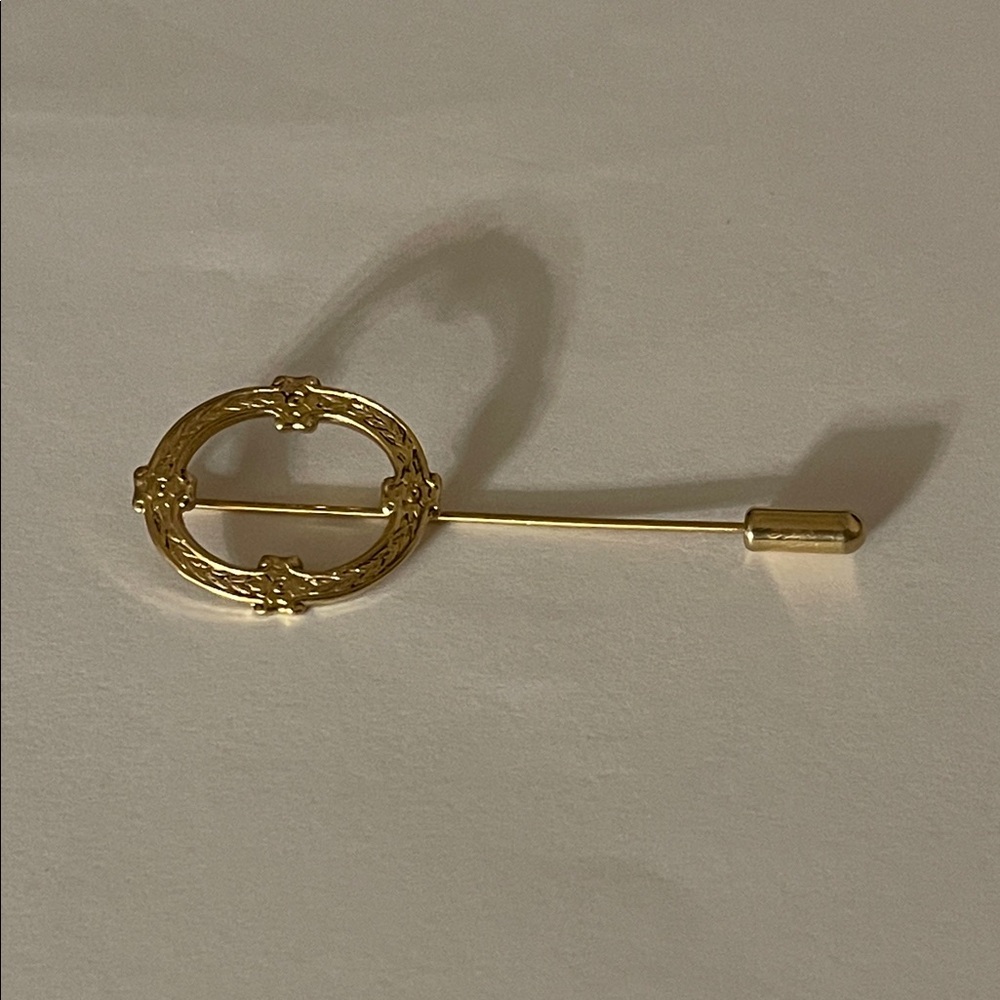 Gold tone metal stick pin